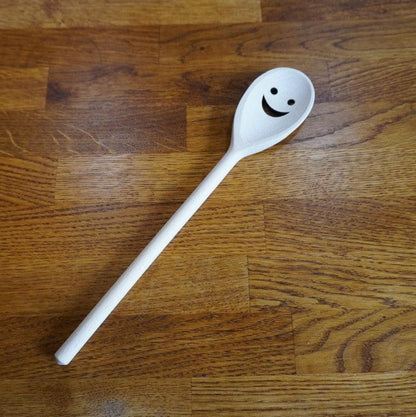 Happy wooden spoon